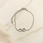 Pulseira em Aço Prateada c/ Infinito e Brilhantes
