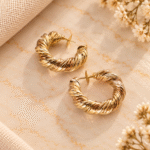 Brincos em Aço Dourado